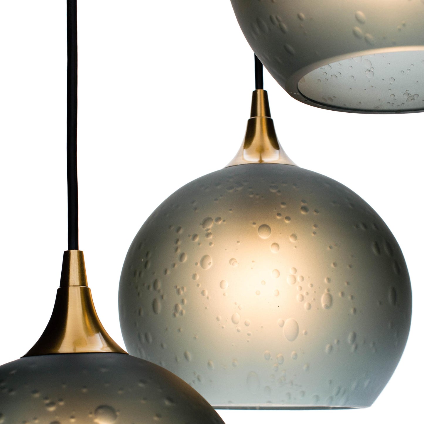 Bicycle Glass Co 767 Celestial: 3 Pendant Cascade Chandelier, Slate Gray Glass, Polished Brass Hardware, Close Up Detail Shot