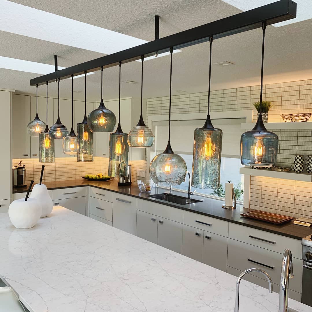 Bicycle Glass Co lucent 301  and 601 lunar 516 and 767 custom mixed glass piece over a kitchen island