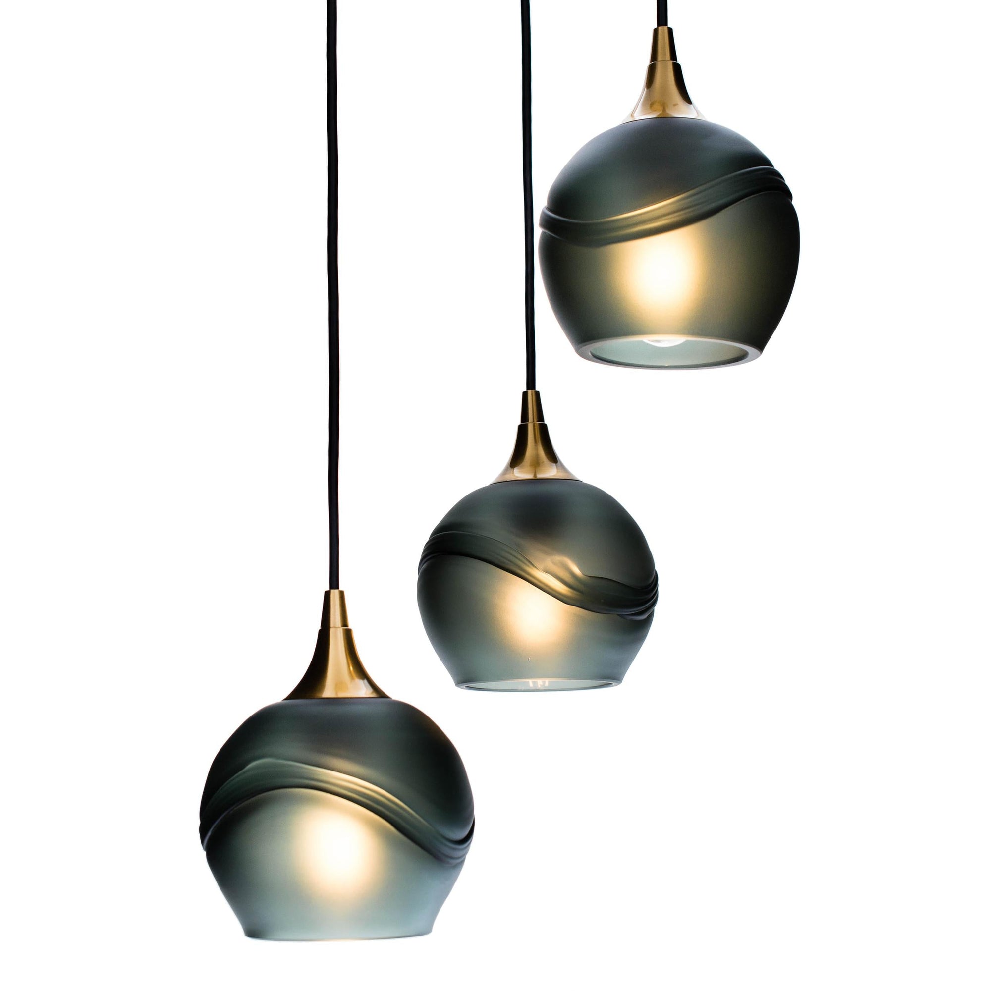 Bicycle Glass Co 763 Glacial: 3 Pendant Cascade Chandelier, Slate Gray Glass, Polished Brass Hardware, Detail Shot, Light Bulbs On