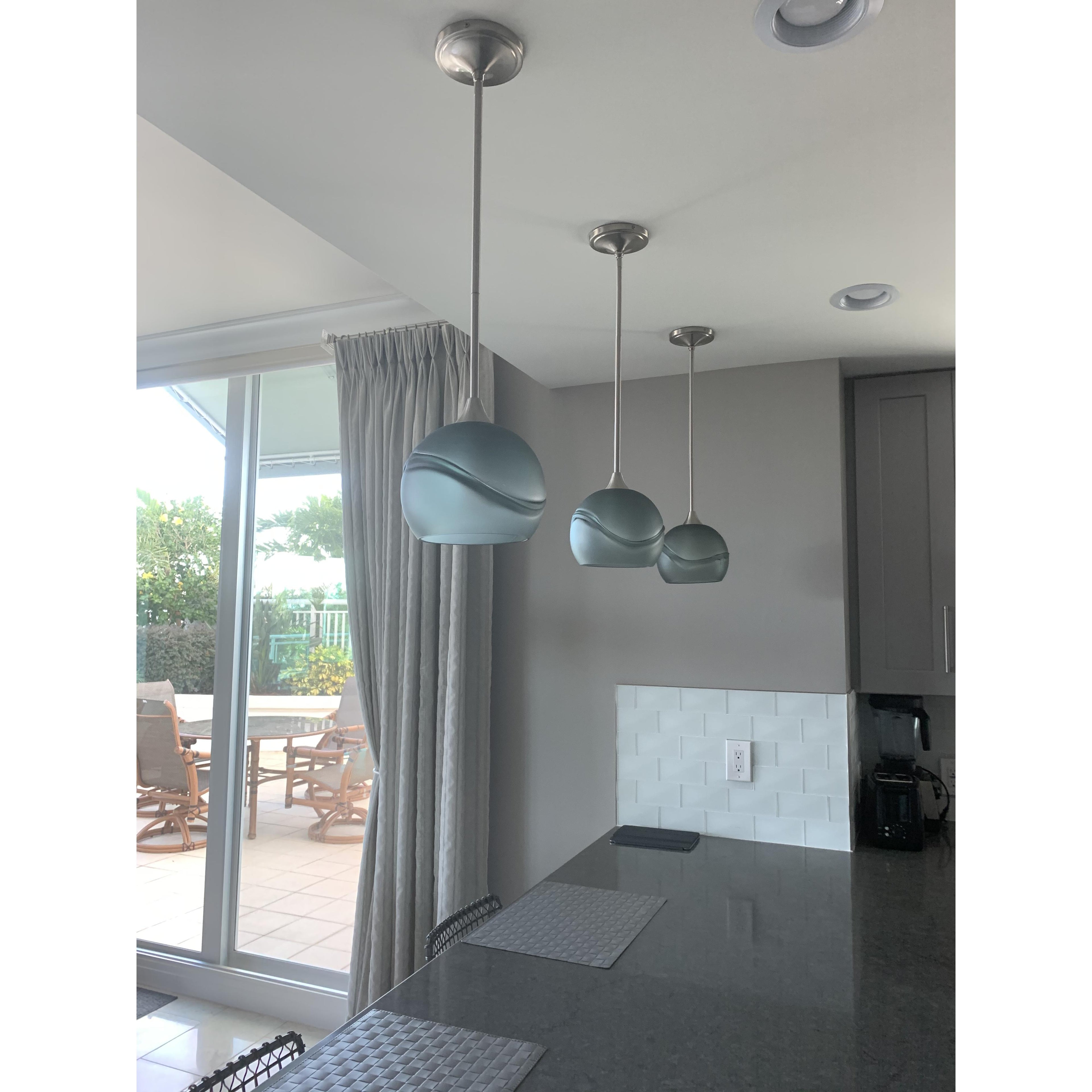 Bicycle Glass Co 767 Glacial: Single Pendant Light, Slate Gray Glass, Brushed Nickel Hardware, Light Bulb On, Lifestyle Shot, Kitchen Island Lighting, 3 Pendant Lights Over a Kitchen Island